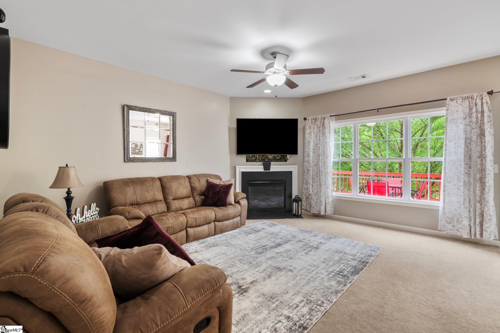 304 Grimes Drive Simpsonville, SC 29681 - Photo 10 of 36 Spacious living room with fireplace