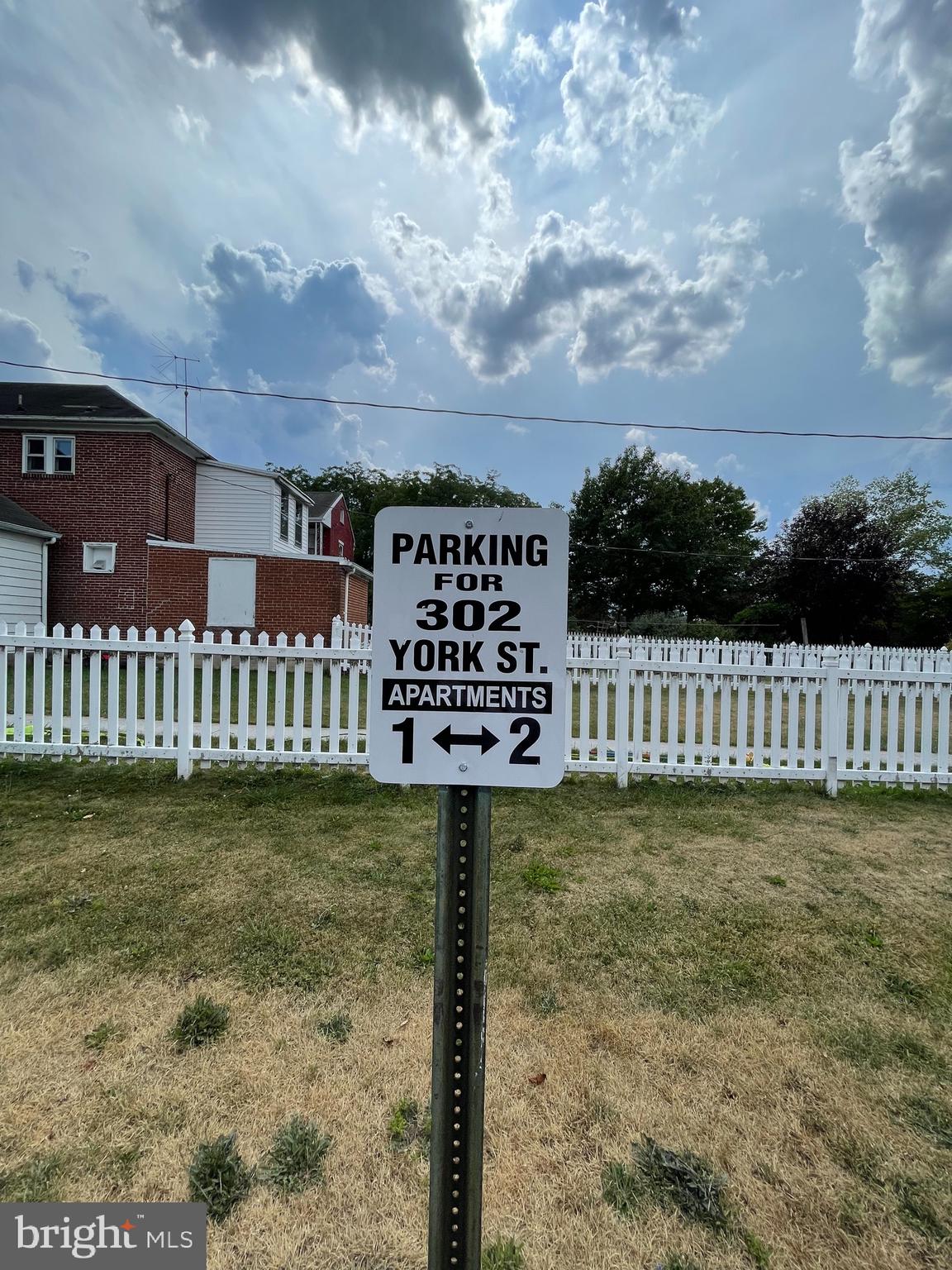 302 York Street, Unit 2 Gettysburg, PA 17325 - Photo 16 of 16 a view of a wooden fence next to a yard