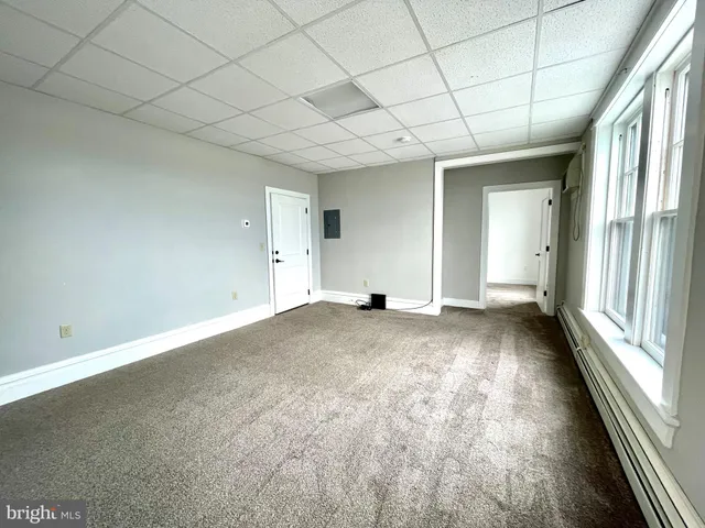 en empty room with windows