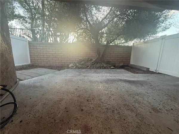 a view of a backyard of a house