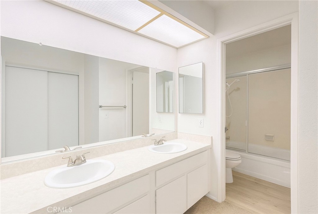 44628 La Paz Road Temecula, CA 92592 - Photo 5 of 14 a bathroom with a granite countertop sink toilet and shower