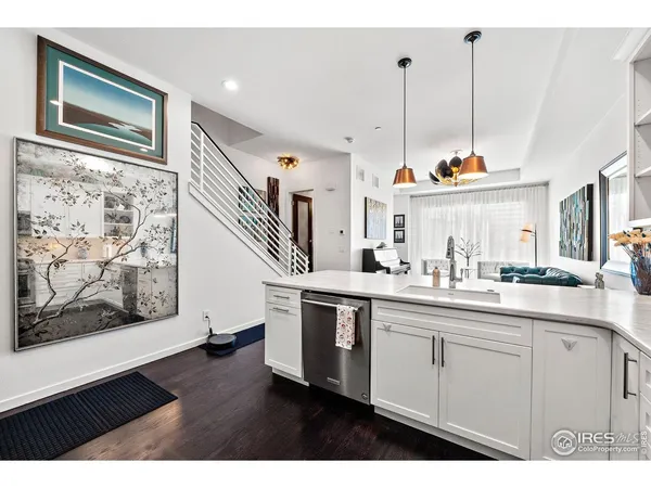 a kitchen with cabinets and window