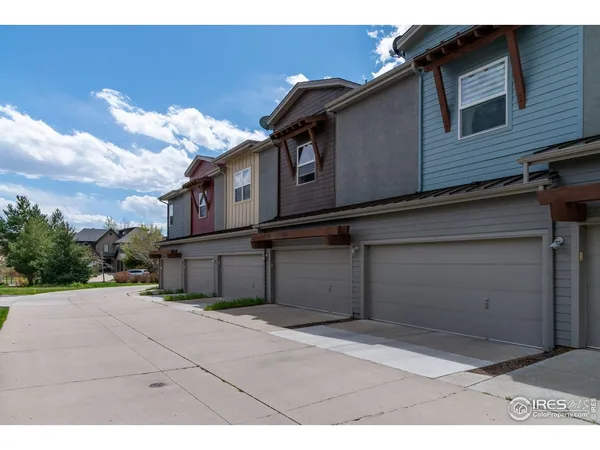 a view of a house with a garage