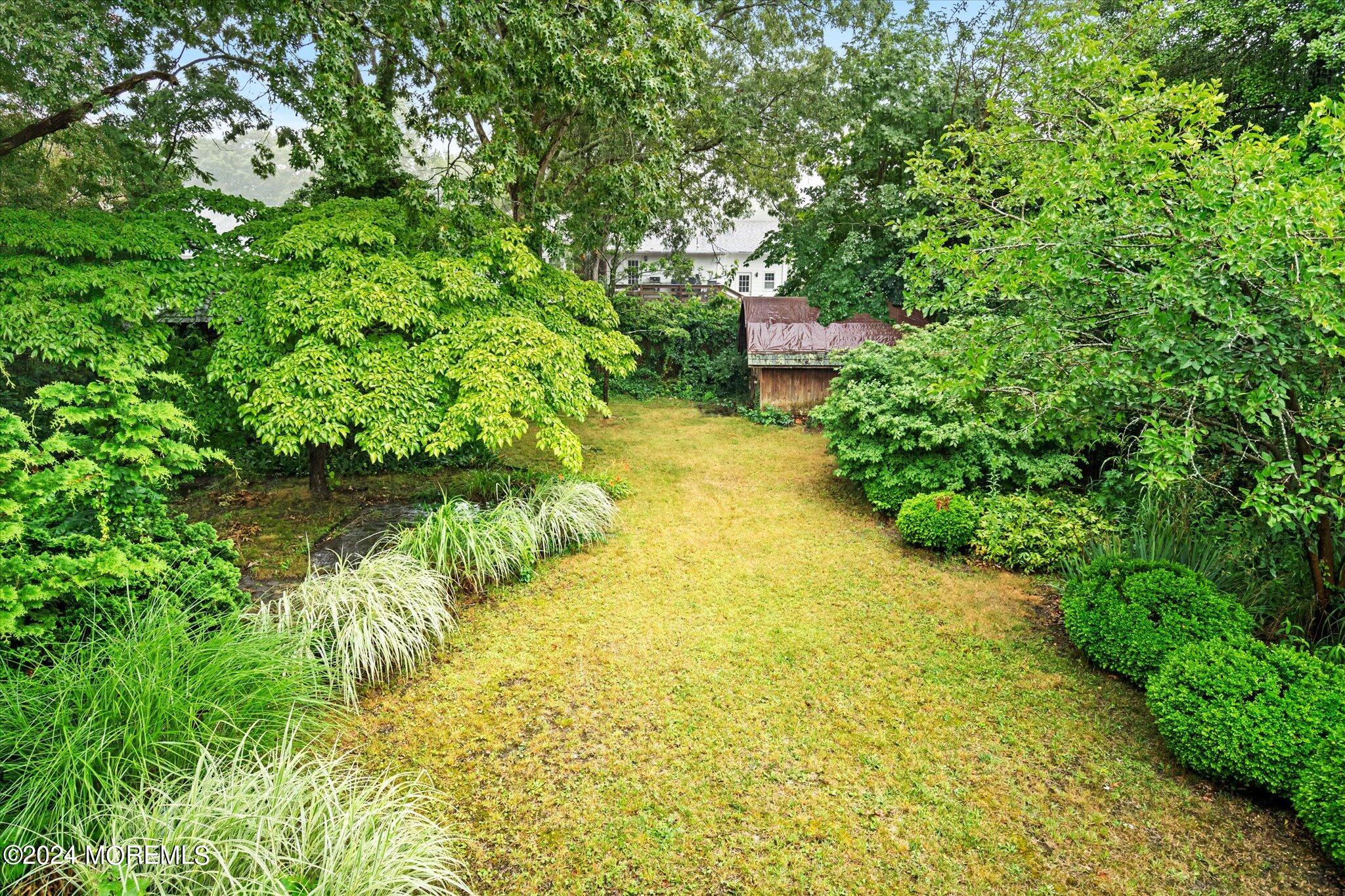 3720 River Road Point Pleasant, NJ 08742 - Photo 28 of 28 a view of a garden with an outdoor space