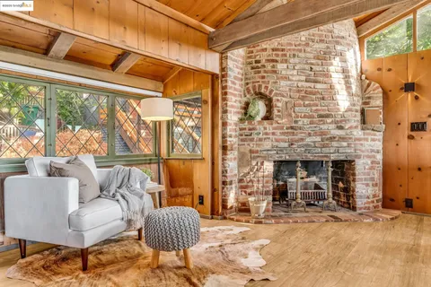 a view of a living room and bathroom