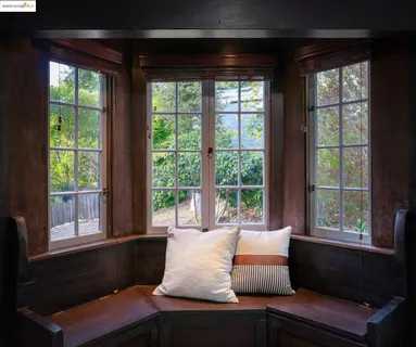 a room with furniture and a large window