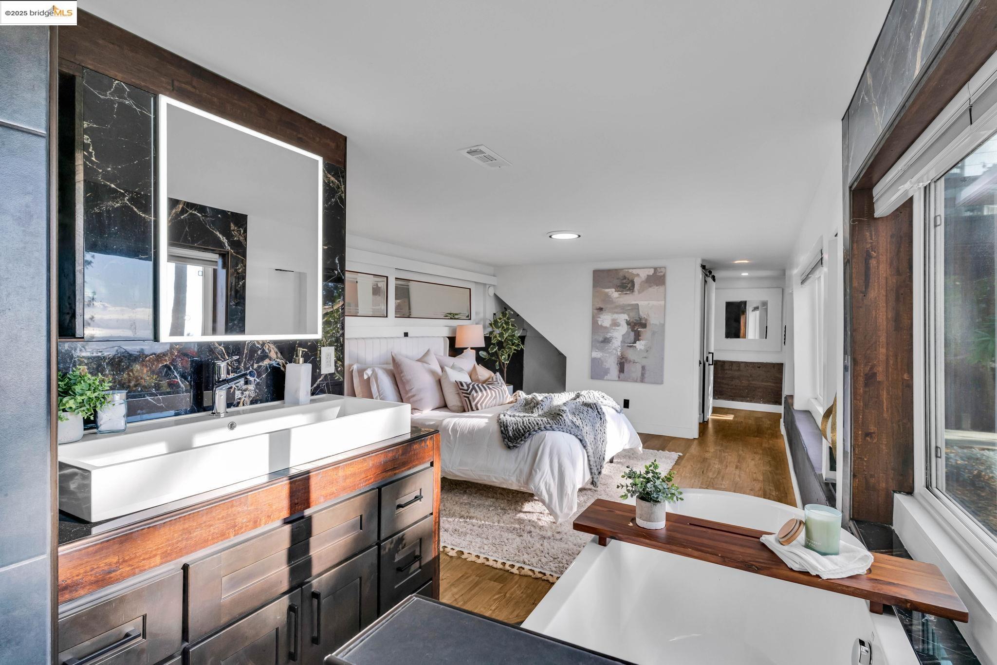 6141 Merriewood Drive Oakland, CA 94611 - Photo 35 of 58 a view of living room filled with furniture and window