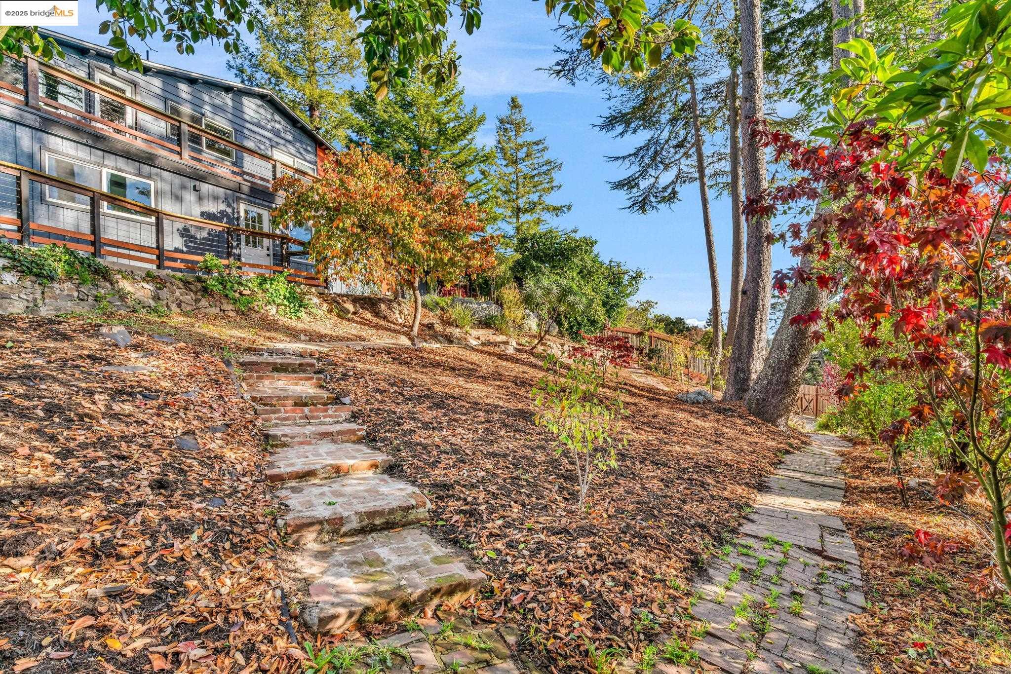 6141 Merriewood Drive Oakland, CA 94611 - Photo 51 of 58 a backyard of a building