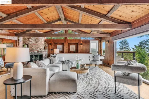 a living room with couches and a coffee table