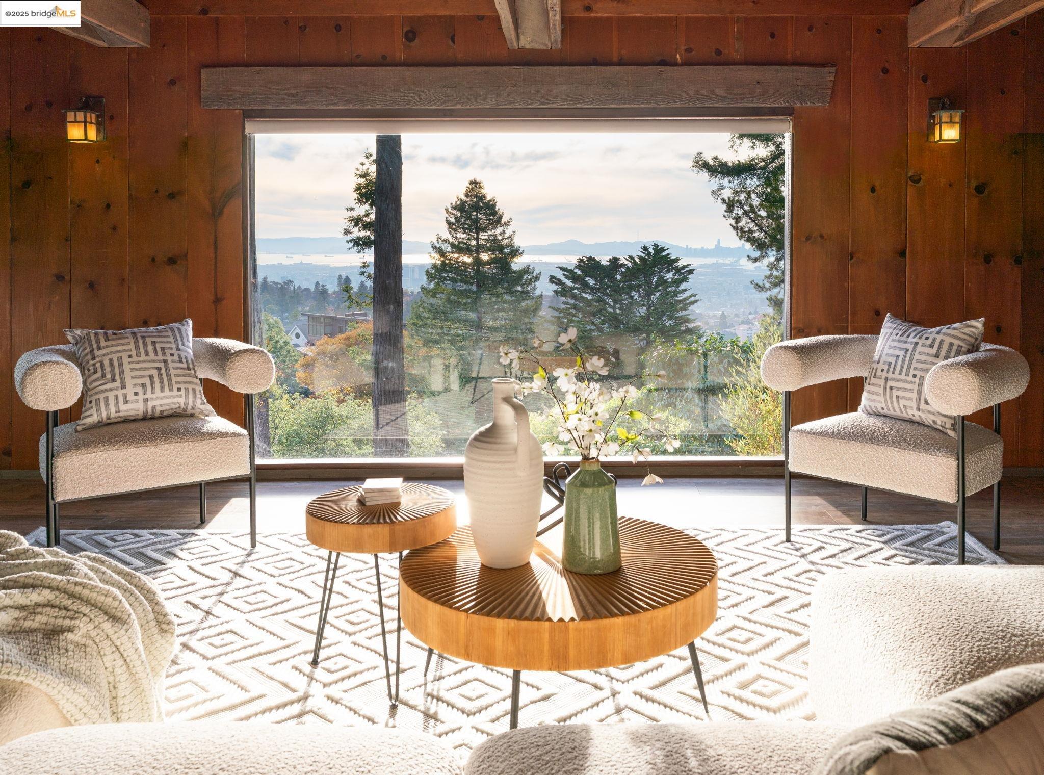 6141 Merriewood Drive Oakland, CA 94611 - Photo 9 of 58 a living room with couches and a coffee table