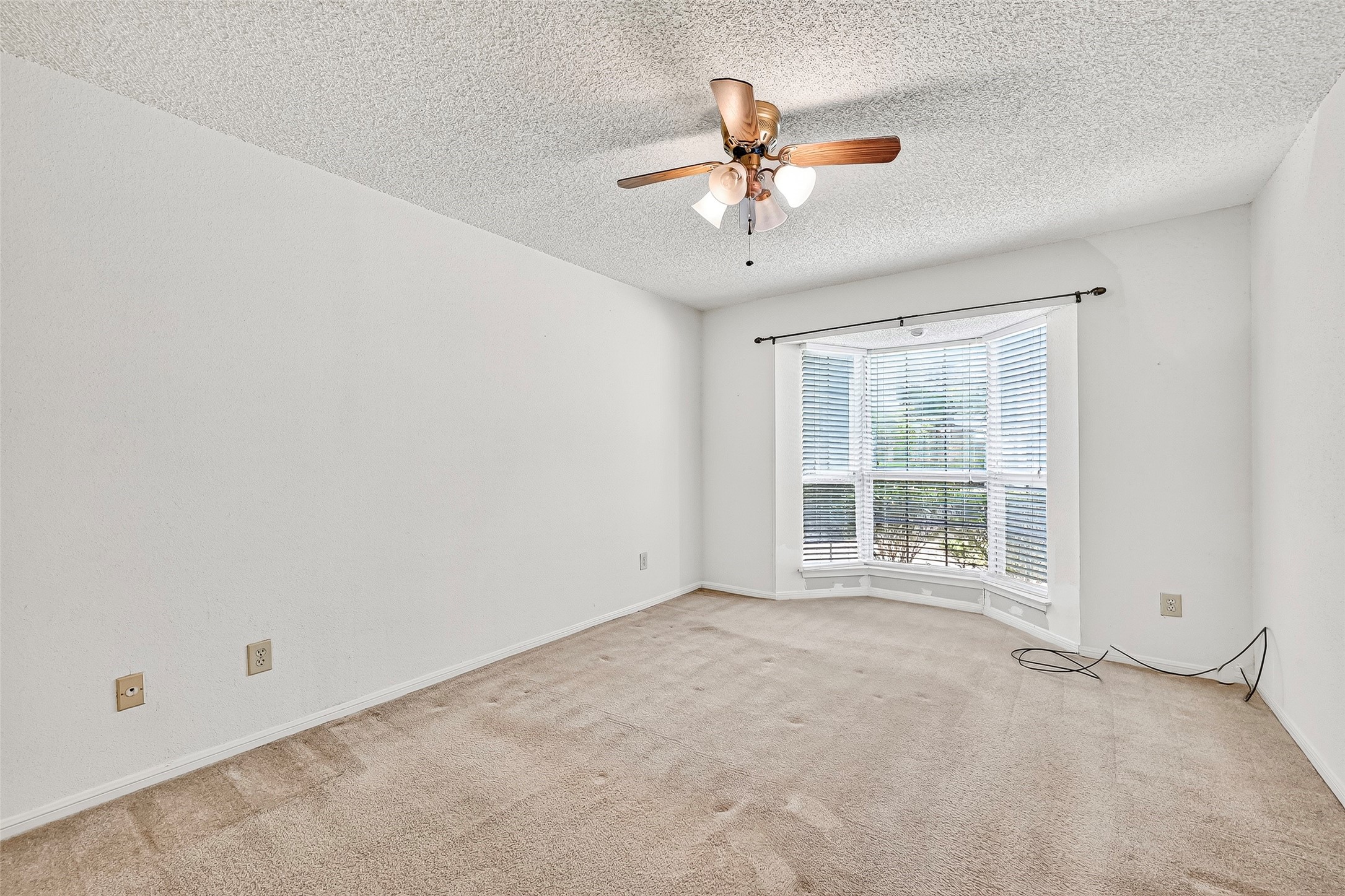 1515 Sandy Springs Road, Unit 3001 Houston, TX 77042 - Photo 13 of 28 a view of an empty room with a window