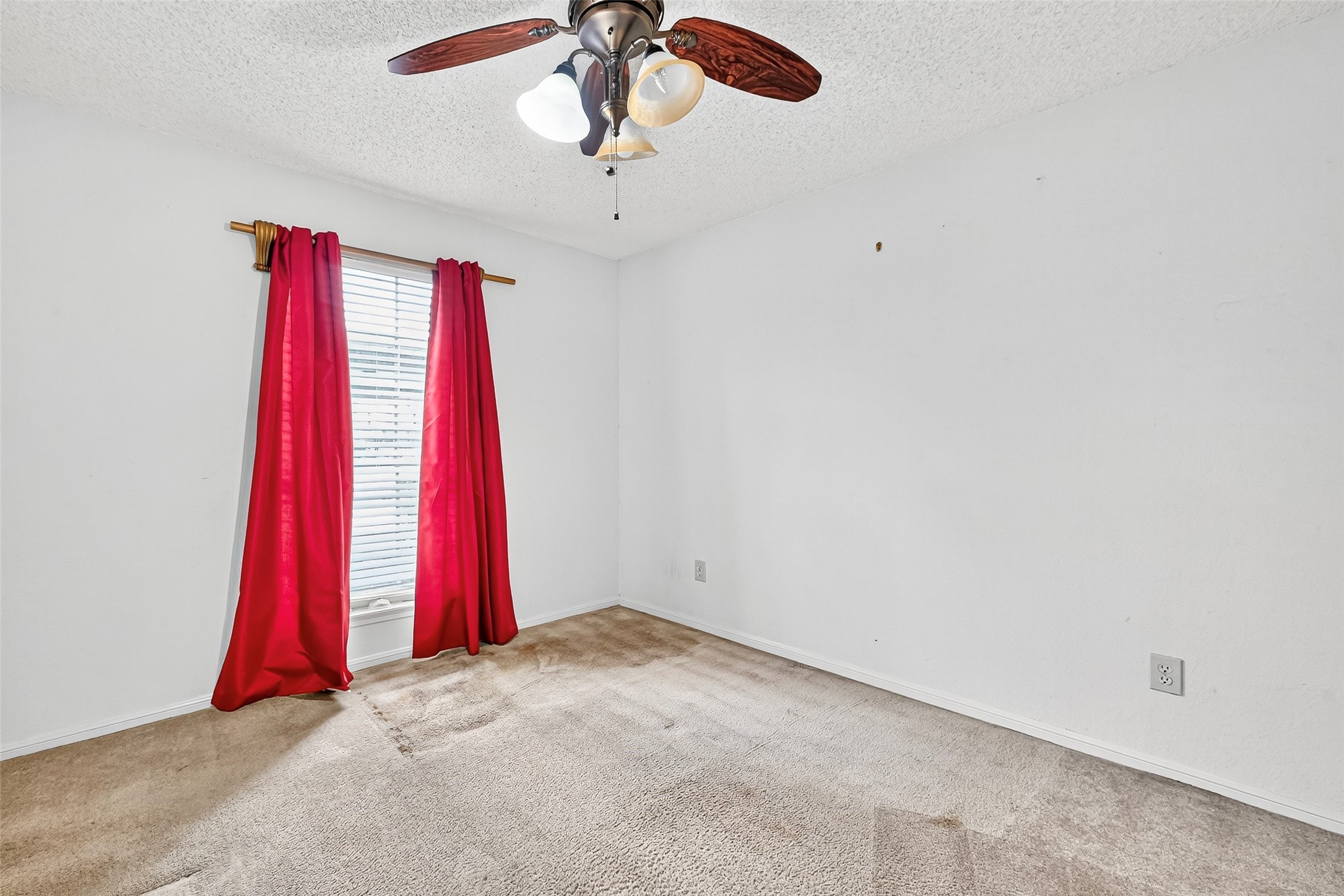 1515 Sandy Springs Road, Unit 3001 Houston, TX 77042 - Photo 17 of 28 a view of a room with window and a ceiling fan