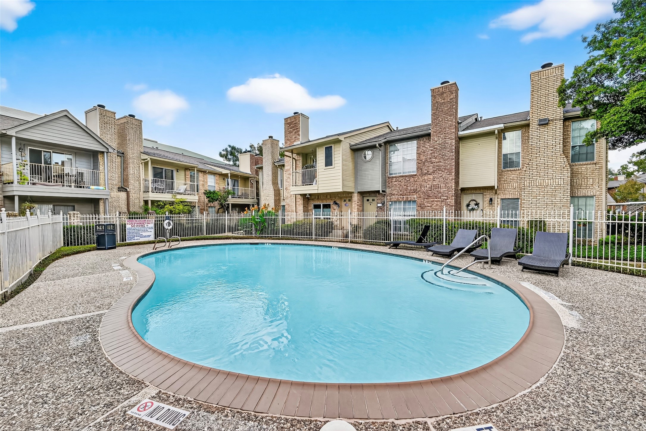 1515 Sandy Springs Road, Unit 3001 Houston, TX 77042 - Photo 24 of 28 a view of a swimming pool with a yard