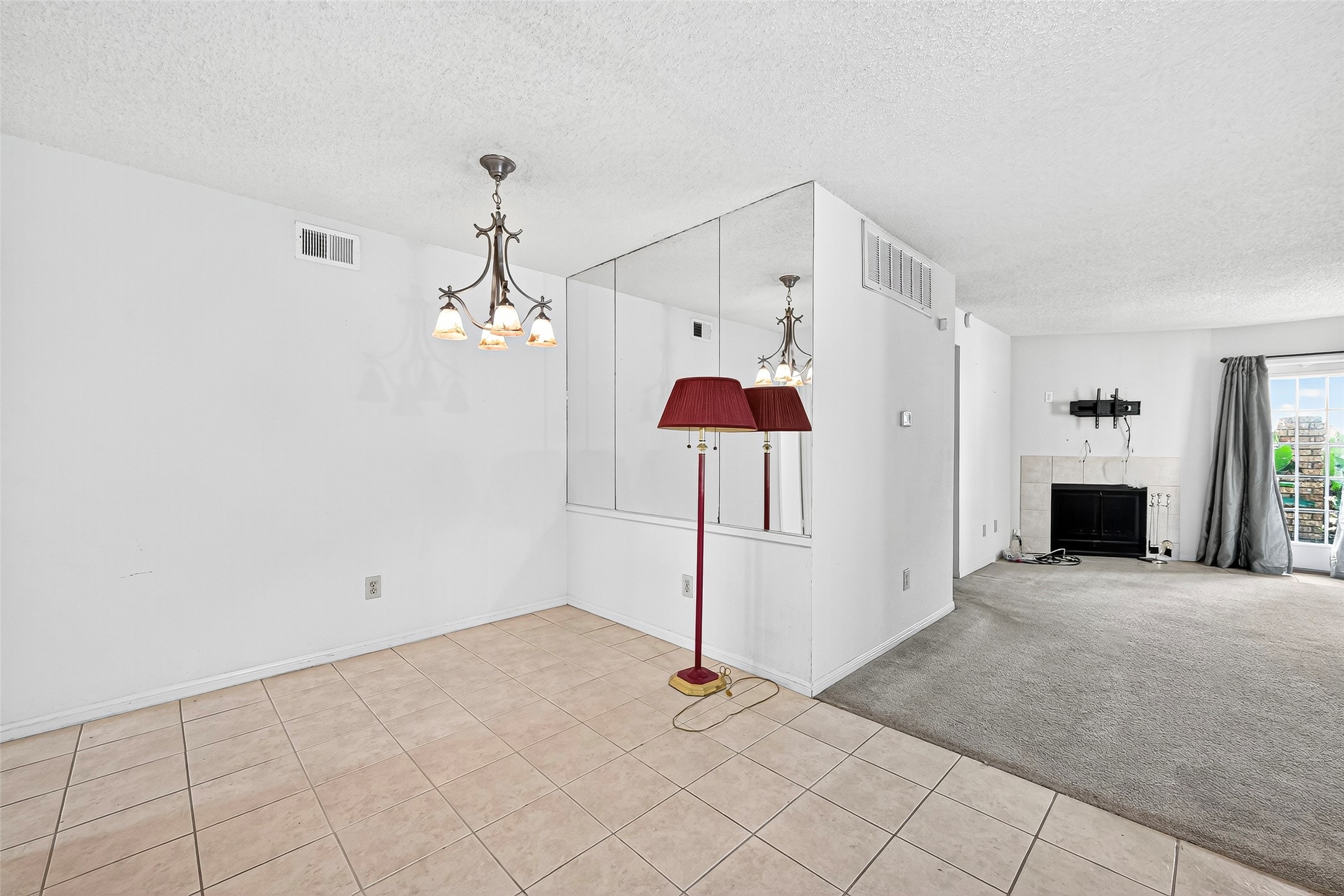 1515 Sandy Springs Road, Unit 3001 Houston, TX 77042 - Photo 6 of 28 a view of a livingroom with an empty space and a kitchen