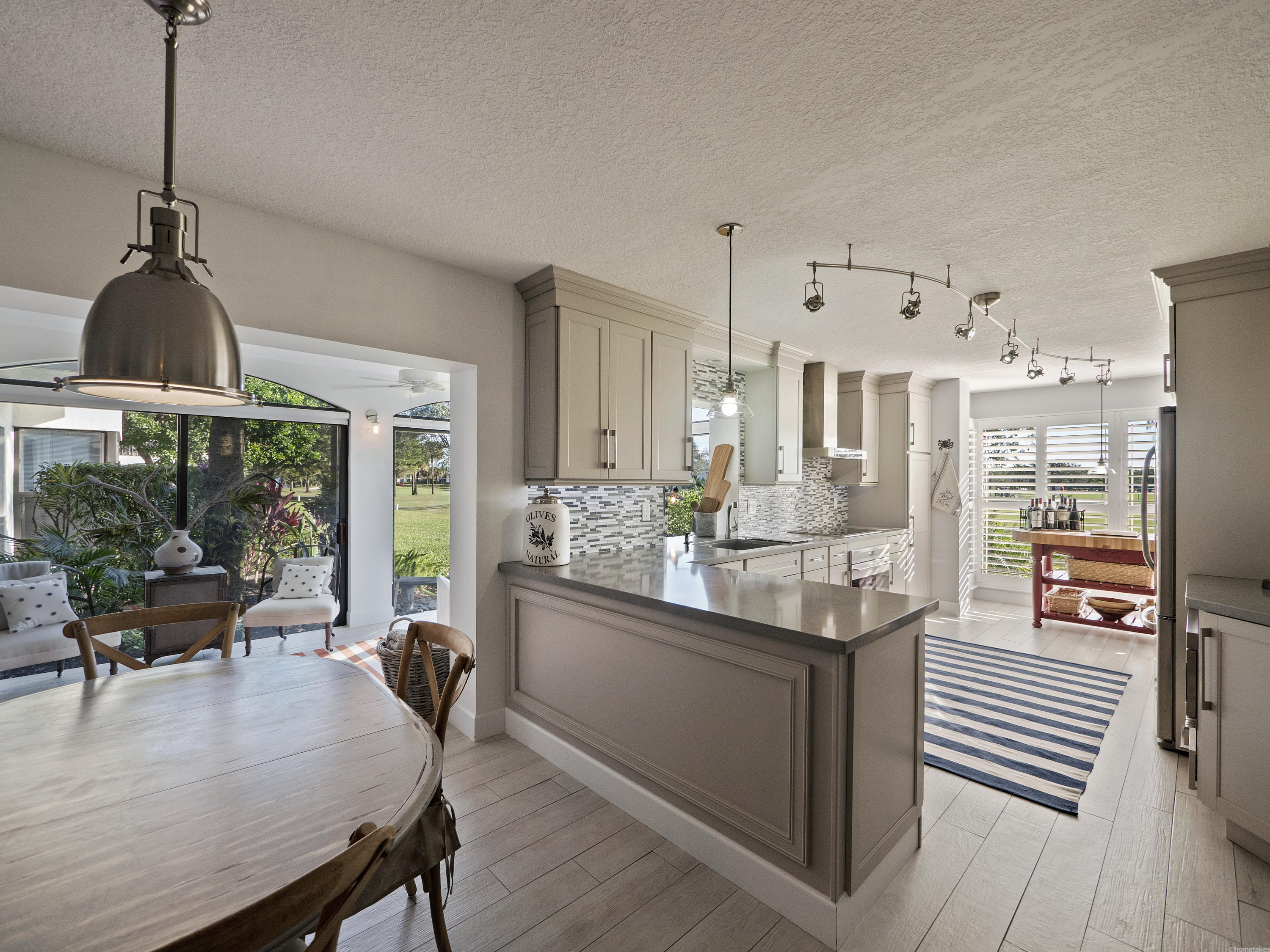 16670 Traders Crossing North, Unit 111 Jupiter, FL 33477 - Photo 1 of 31 Kitchen/Dining/Florida Rooms