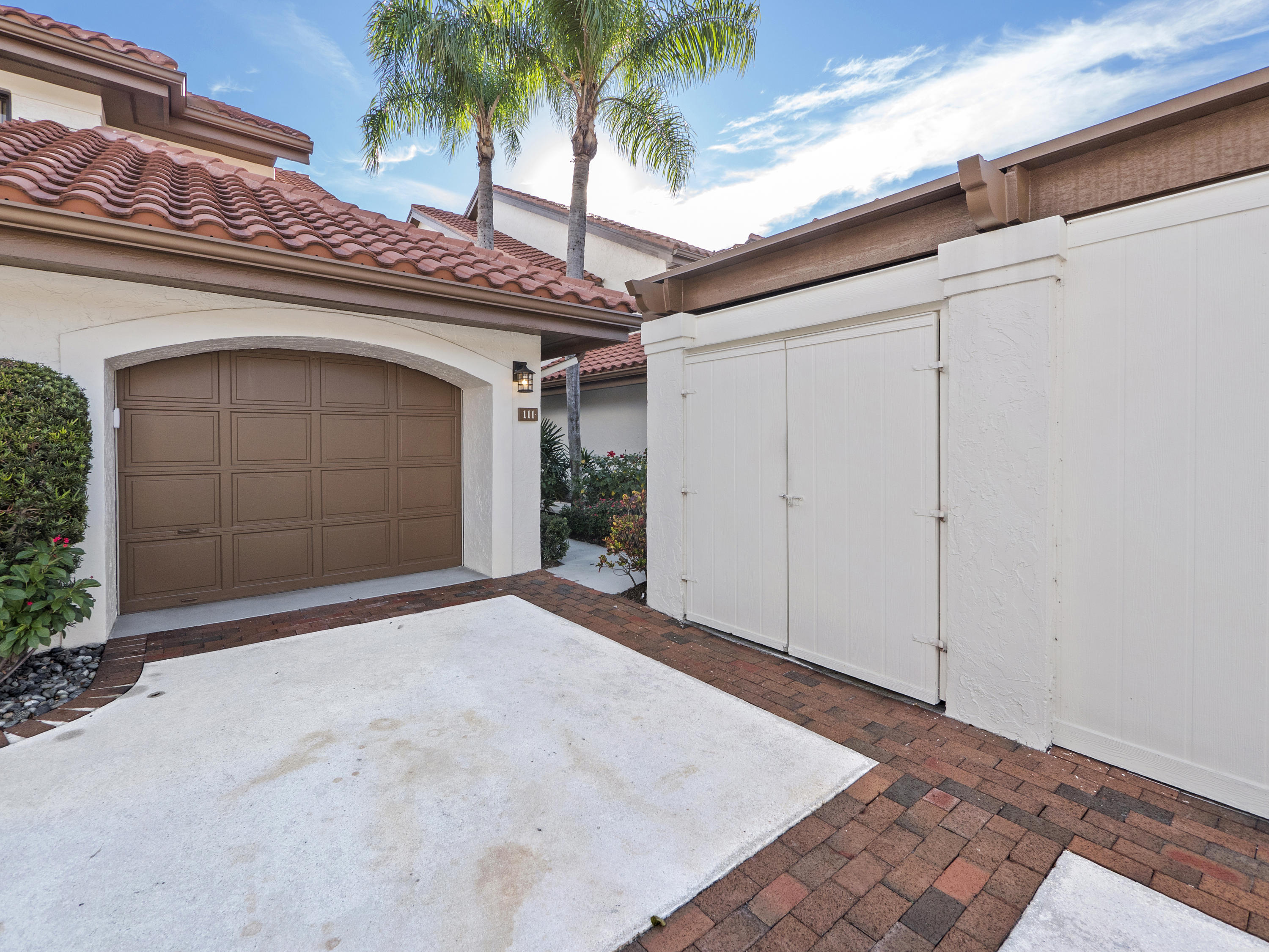 16670 Traders Crossing North, Unit 111 Jupiter, FL 33477 - Photo 2 of 31 Exterior Front