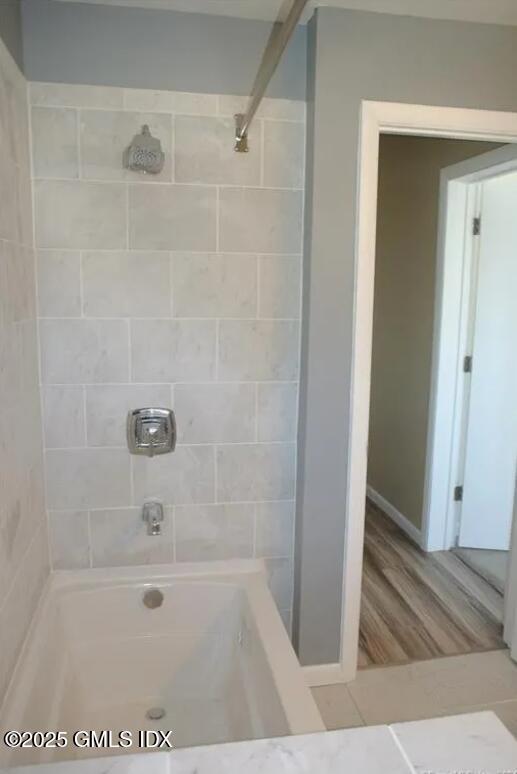 300-302 Soundview Avenue, Unit 2 Fairfield, CT 06825 - Photo 15 of 20 a bathroom with a bathtub