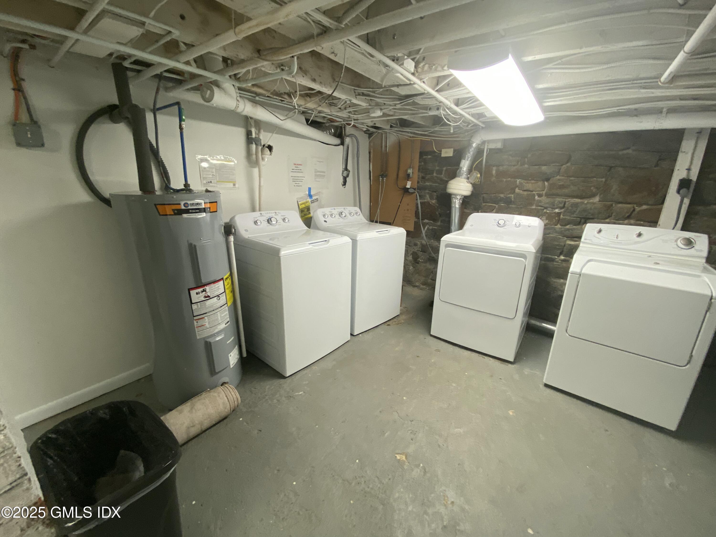 300-302 Soundview Avenue, Unit 2 Fairfield, CT 06825 - Photo 20 of 20 a utility room with dryer and washer