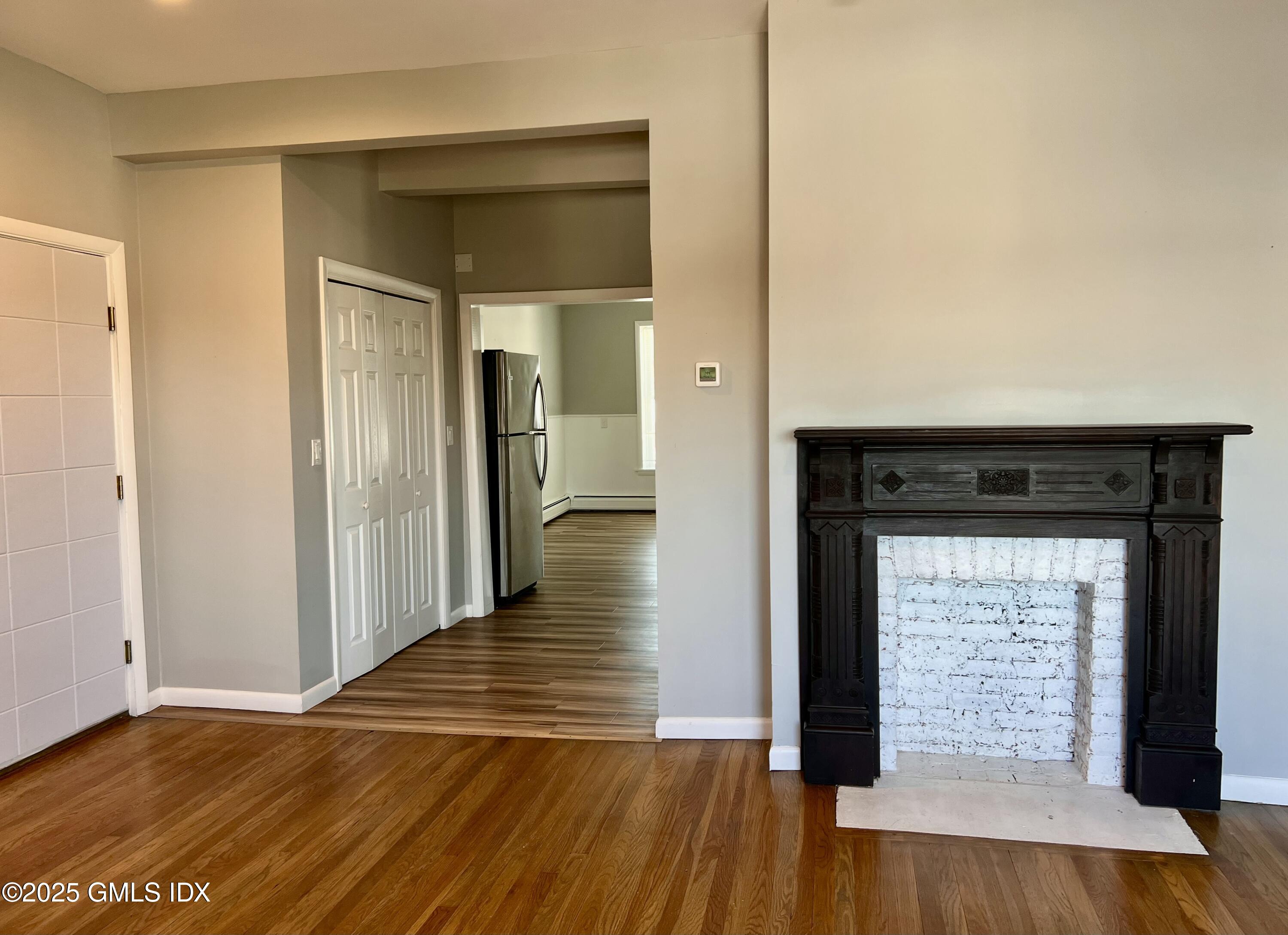 300-302 Soundview Avenue, Unit 2 Fairfield, CT 06825 - Photo 2 of 20 a view of an entryway of wooden floor