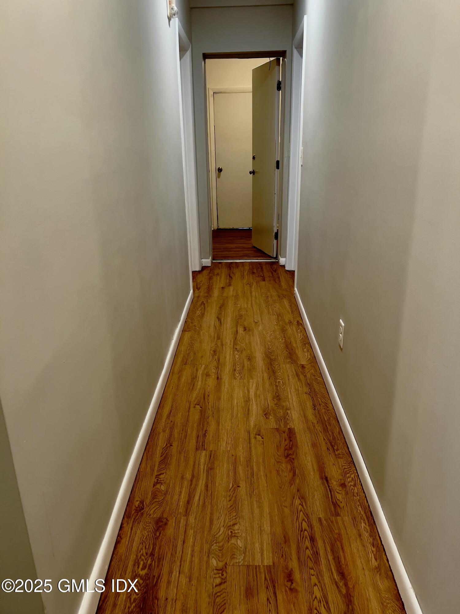300-302 Soundview Avenue, Unit 2 Fairfield, CT 06825 - Photo 9 of 20 a view of a hallway