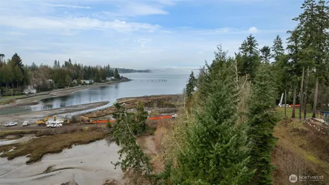 a view of a lake with green space