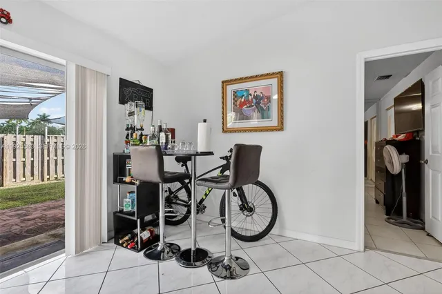 a view of a workspace with furniture