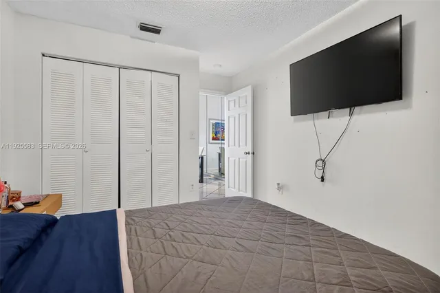 a view of a livingroom with a flat screen tv