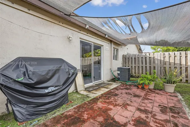 a car park in front of a house