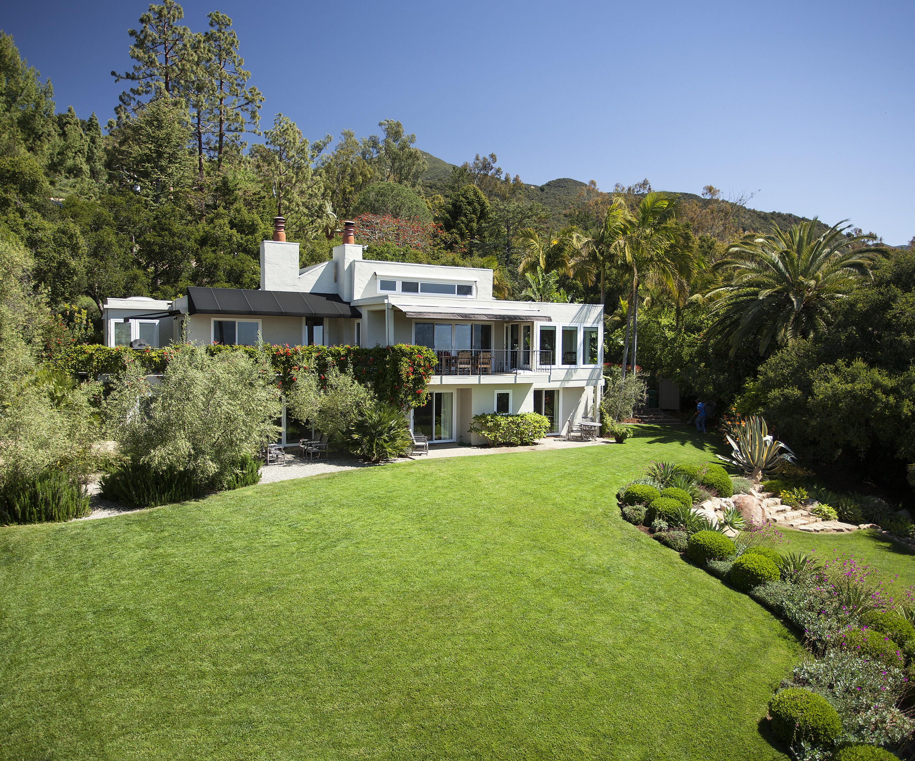 a view of a house with a garden