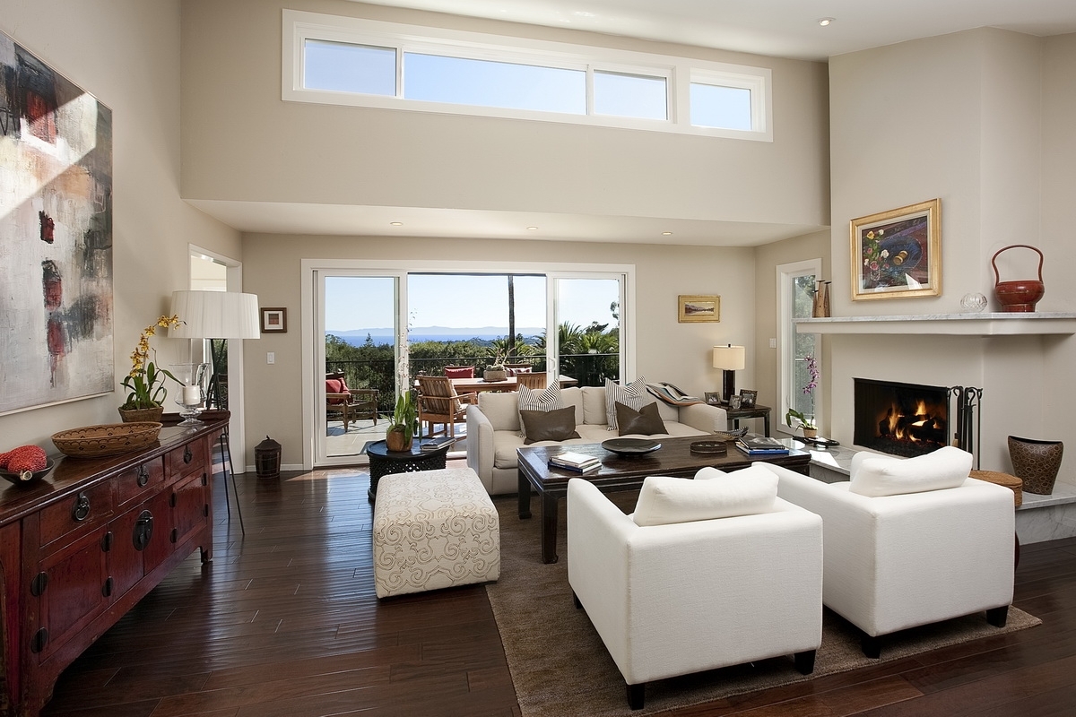 1075 Cold Spring Road Montecito, CA 93108 - Photo 2 of 7 a living room with fireplace furniture and a large window