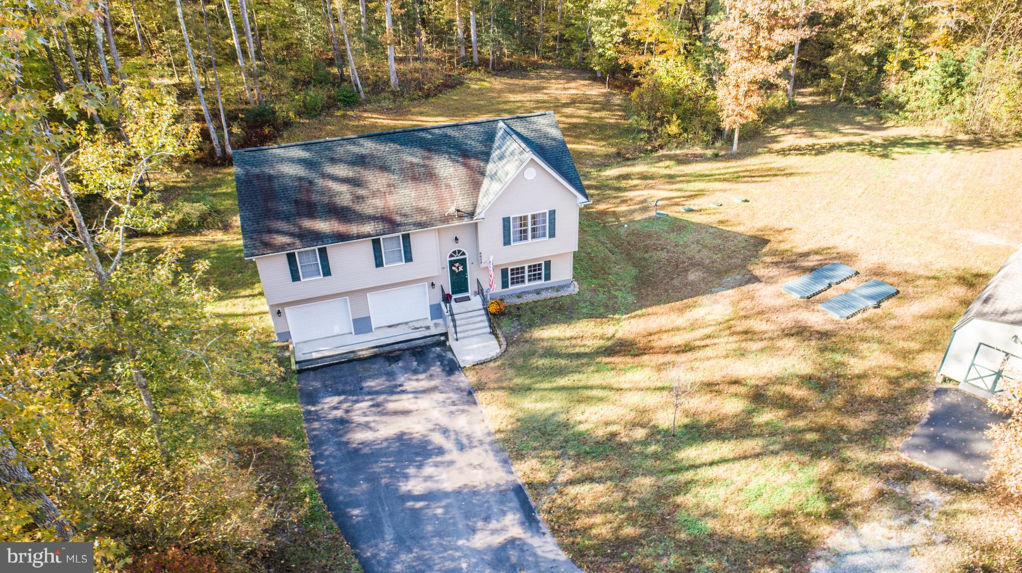 6628 Partlow Road Spotsylvania, VA 22551 - Photo 3 of 22 a view of house with outdoor space