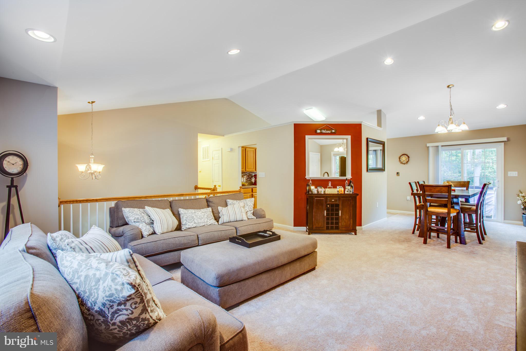 6628 Partlow Road Spotsylvania, VA 22551 - Photo 5 of 22 a living room with furniture and a large window