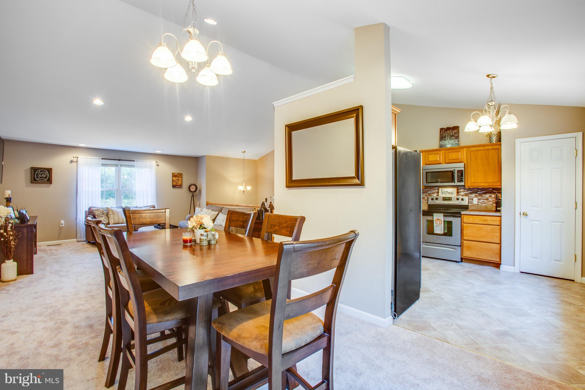 6628 Partlow Road Spotsylvania, VA 22551 - Photo 7 of 22 a view of a dining room and livingroom view