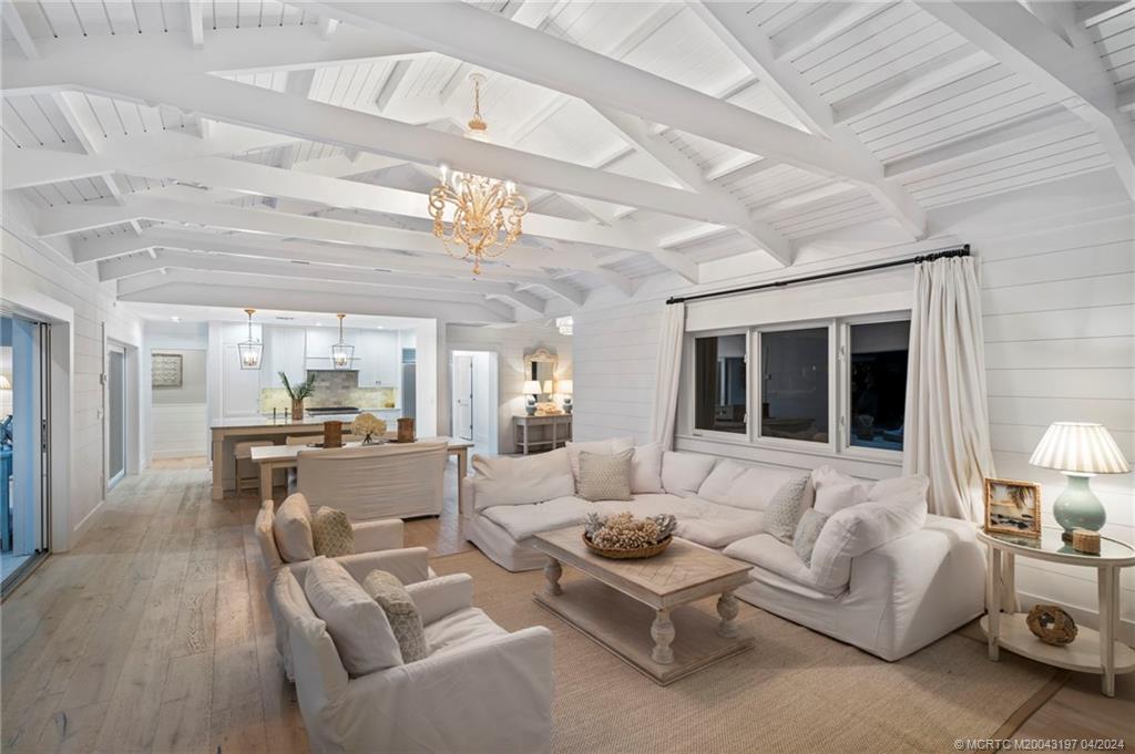 19 River Drive Jupiter, FL 33469 - Photo 16 of 46 a living room with furniture and a large window