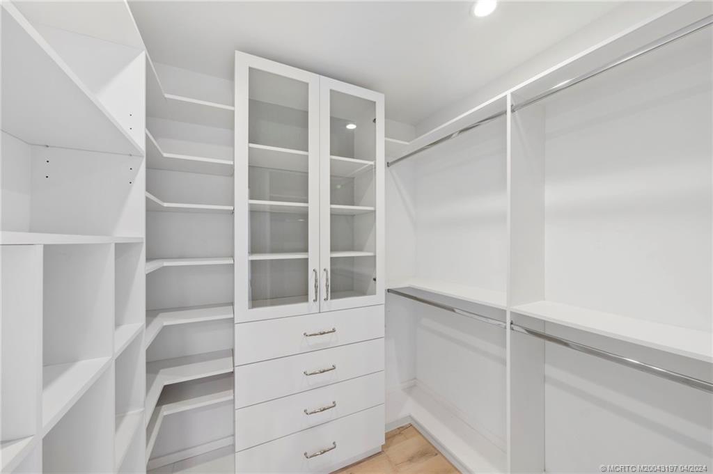 19 River Drive Jupiter, FL 33469 - Photo 24 of 46 a view of an empty walk in closet