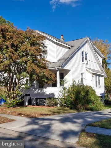a front view of house with yard
