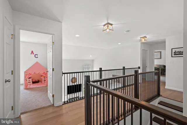 a view of a hallway view with staircase