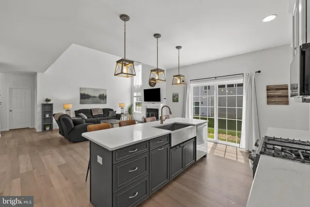 a view of living room with furniture and flat screen tv