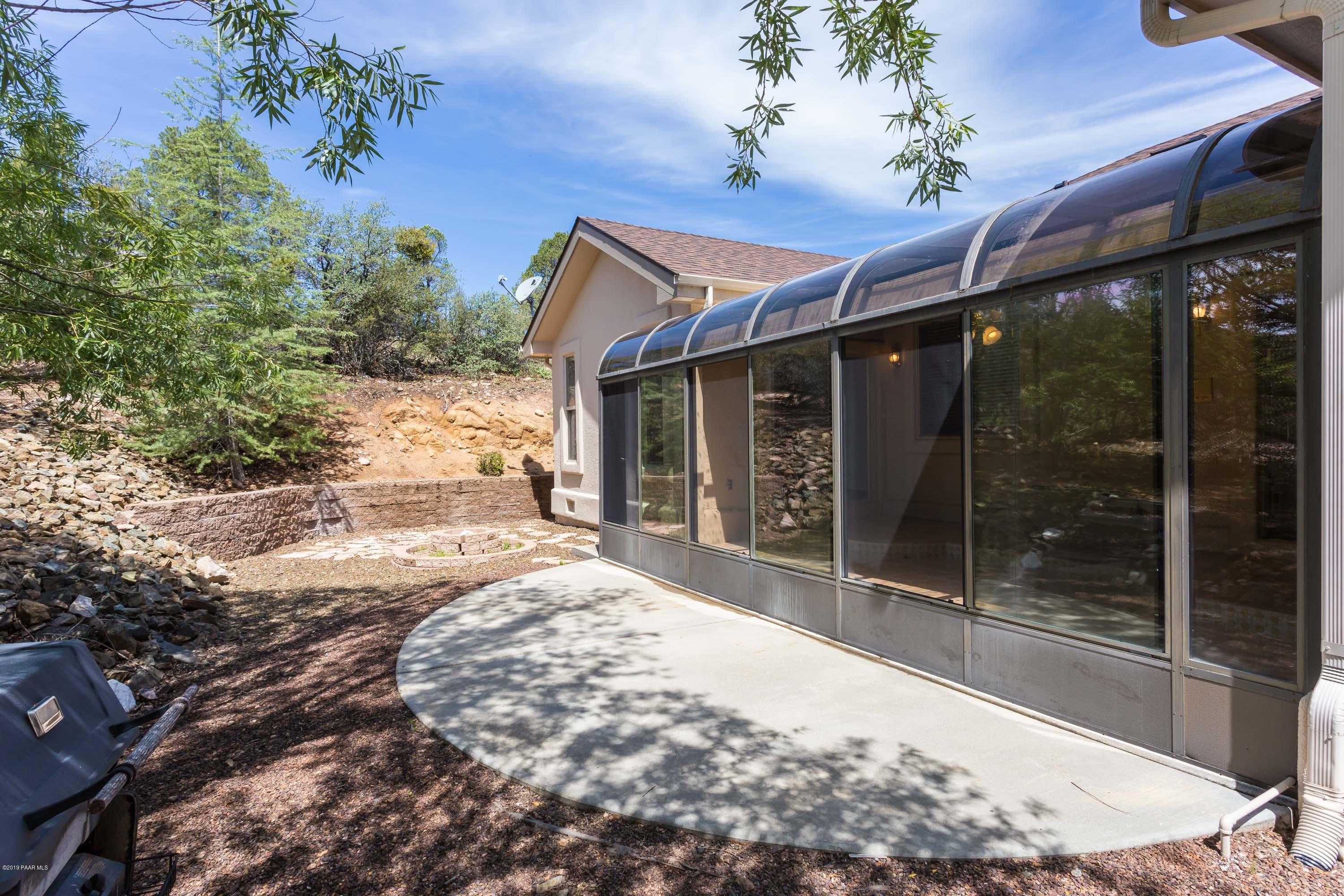 1409 Eureka Ridge Way Prescott, AZ 86303 - Photo 4 of 27 Sunroom in backyard