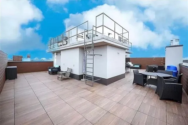 a view of a terrace with chairs