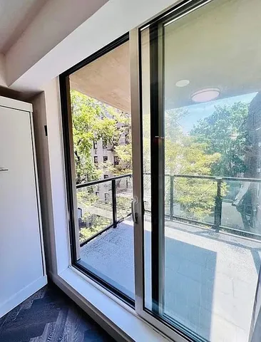 a view of a large window with an outdoor space