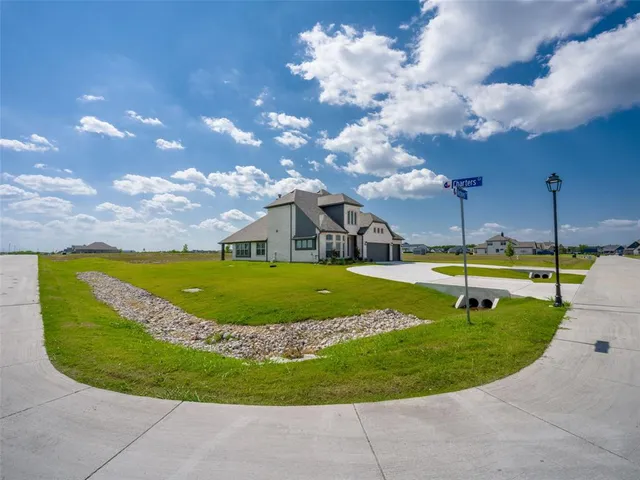 a view of a house with a swimming pool
