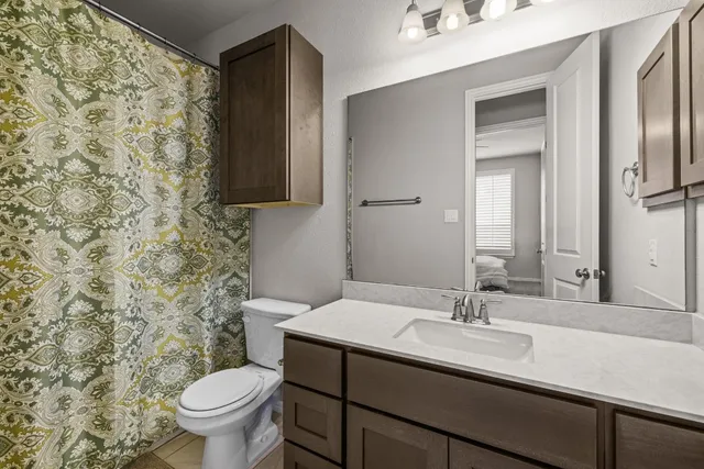 a white bath tub sitting next to a window