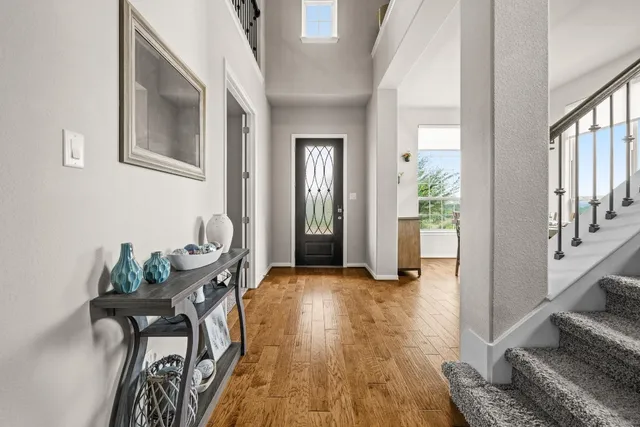 a view of a livingroom with furniture and wooden floor