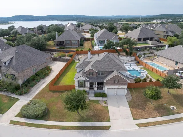 a view of a patio with couches chairs and potted plants