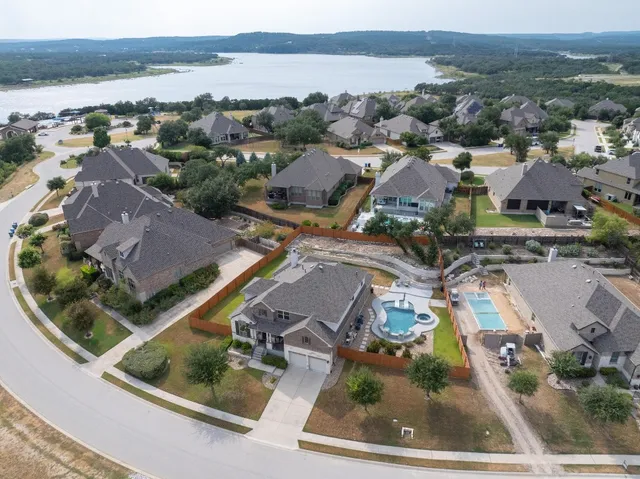 a view of a swimming pool with a terrace