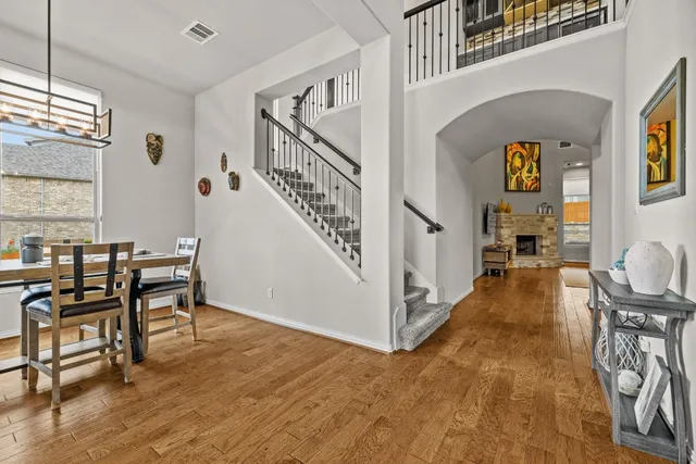 a view of a livingroom with furniture and wooden floor