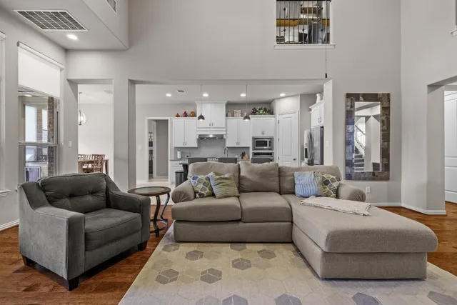 a living room with furniture and a couch