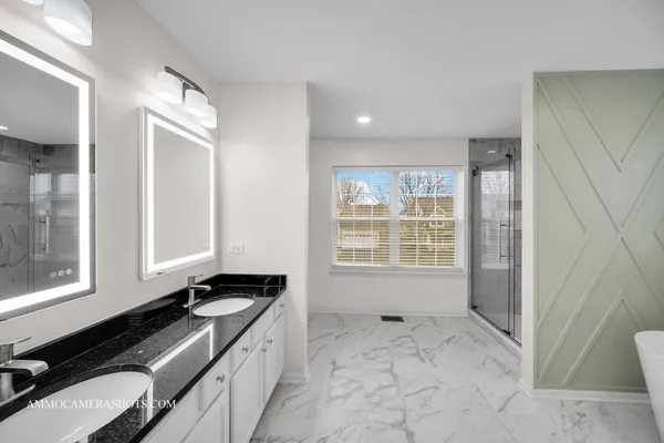 a kitchen with a sink and a stove top oven