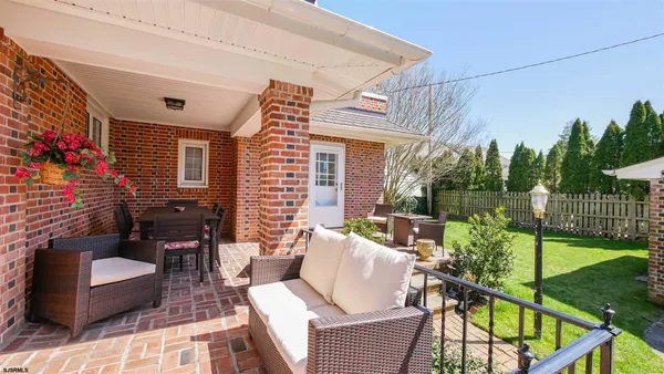 a outdoor living space with furniture and garden view